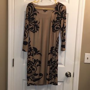 Selling this super sexy dress tan and black